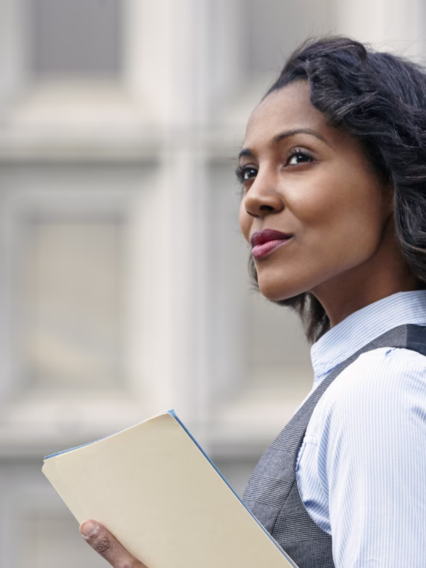 portrait of young business woman holding paper wor 2025 04 05 11 16 58 utc
